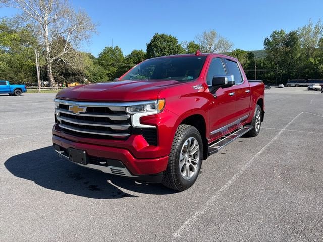 2023 Chevrolet Silverado 1500 High Country in Radiant Red Tintcoat — front three-quarter view